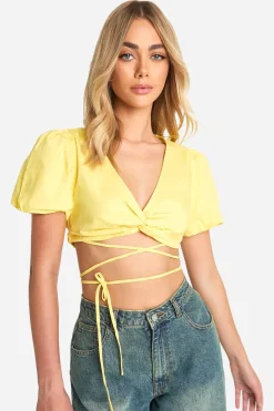 Crop top à nouer à l'avant avec manches bouffantes