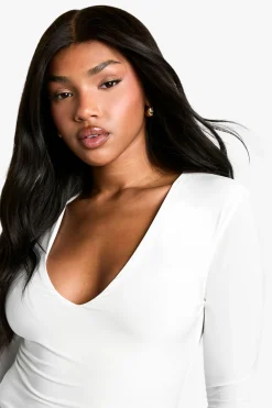 Double couche en tissu fluide avec décolleté plongeant à l’avant et manches longues