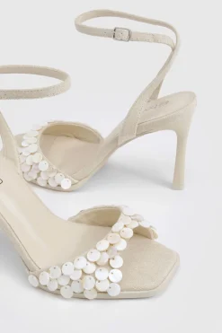 Détail de garniture en coquillage - Talons 2 parties