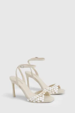 Détail de garniture en coquillage - Talons 2 parties