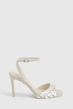 Détail de garniture en coquillage - Talons 2 parties