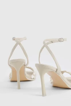 Détail de garniture en coquillage - Talons 2 parties