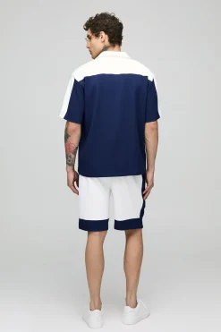 Ensemble chemise à panneaux plissée à manches courtes surdimensionnée et short
