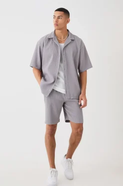 Ensemble chemise plissée à manches courtes surdimensionnée et short