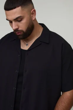 Ensemble chemise à plis surdimensionnée et pantalon fuselé