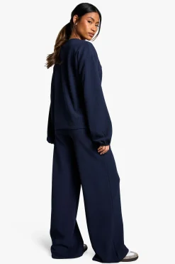 Ensemble coordonné en côtes : blouse à nouer à l'avant et pantalon