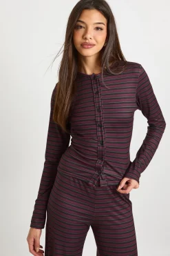 Ensemble coordonné haut à manches longues et pantalon avec patte boutonnée ornée de rayures