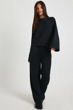 Ensemble coordonné haut oversize à manches longues effet froissé et pantalon à jambes larges