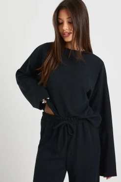 Ensemble coordonné haut oversize à manches longues effet froissé et pantalon à jambes larges