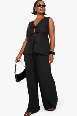 Ensemble coordonné look lin, haut à nouer à l'avant et pantalon à jambes larges