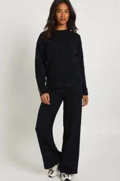 Ensemble coordonné pour femmes petites : pull oversize en tissu ultra doux avec détails de poignets boutonnés et pantalon à jambes larges