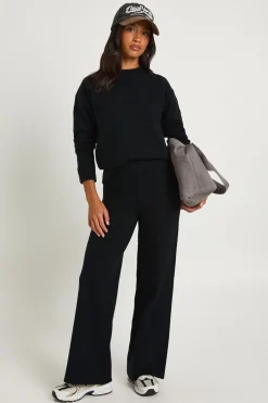 Ensemble coordonné pour femmes petites : pull oversize en tissu ultra doux avec détails de poignets boutonnés et pantalon à jambes larges