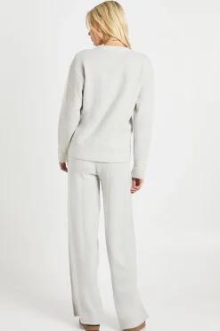 Ensemble coordonné : pull surdimensionné ultra-doux avec détails de manchette boutonnée et pantalon à jambe large