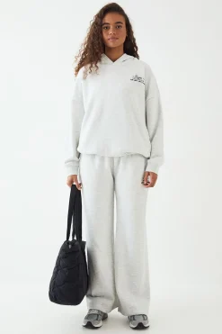 DSGN Studio Ensemble de Survêtement à Casynthétiqueche Oversize Wellness Club<Femme Survêtements|Survêtements