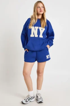 Ensemble De Survêtement Court À Casynthétiqueche Avec Appliqué Ny Petite