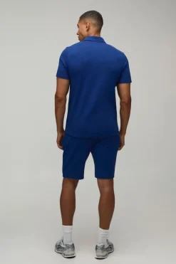 Ensemble Polo Ajusté Col Zippé Et Short En Tissu Gaufré