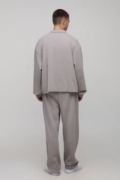Ensemble polo rugby et jogger en interlock premium, surdimensionné, à coupe carrée et à détails dissimulés