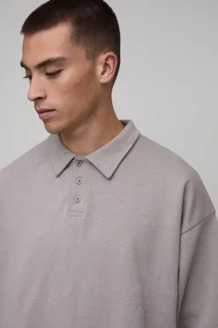Ensemble polo rugby et jogger en interlock premium, surdimensionné, à coupe carrée et à détails dissimulés