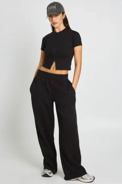 Ensemble Survêtement Côtelé Avec Haut Court Zippé À Manches Courtes Et Pantalon De Jogging