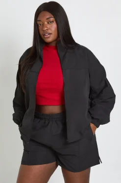 Ensemble Survêtement Grande Taille Veste Zippée Col Montant Et Short En Nylon