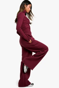 Ensemble top à double fermeture éclair avec détail de couture côtelé et joggeurs à jambe droite