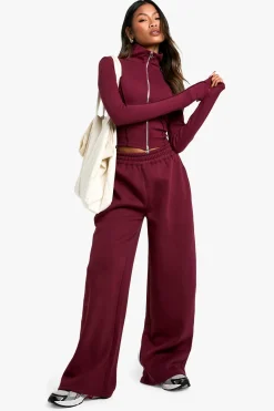 Ensemble top à double fermeture éclair avec détail de couture côtelé et joggeurs à jambe droite