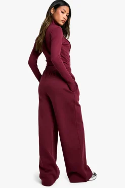 Ensemble top à double fermeture éclair avec détail de couture côtelé et joggeurs à jambe droite