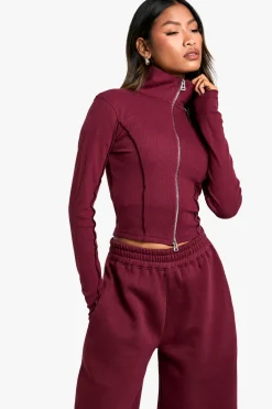 Ensemble top à double fermeture éclair avec détail de couture côtelé et joggeurs à jambe droite