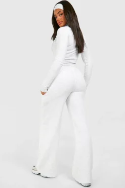 Ensemble top à double zip avec détails en côtes et joggers à jambe droite