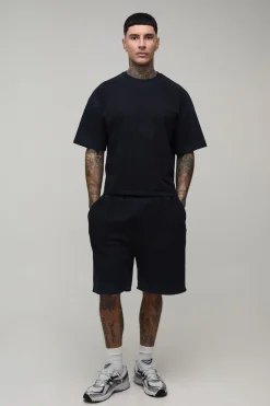 Ensemble T-shirt Et Short Oversize Rétréci Avec Lavage Spray Aux Coutures Pour Grande Taille