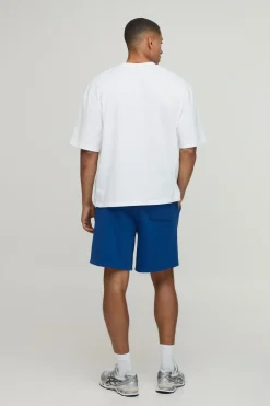 Ensemble T-shirt Oversize À Ourlet Asymétrique Et Short Ample Avec Inscription Man