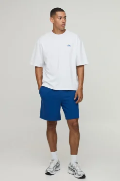 Ensemble T-shirt Oversize À Ourlet Asymétrique Et Short Ample Avec Inscription Man