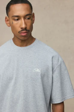 Ensemble T-shirt Oversize À Ourlet Asymétrique Avec Inscription Man Et Short Ample