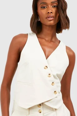 Gilet ajusté asymétrique en imitation corne