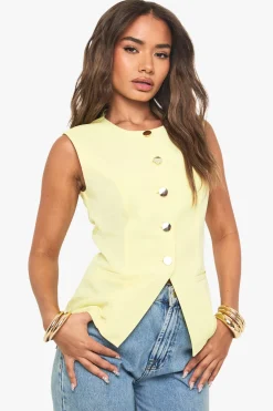 Gilet ajusté à boutons dorés