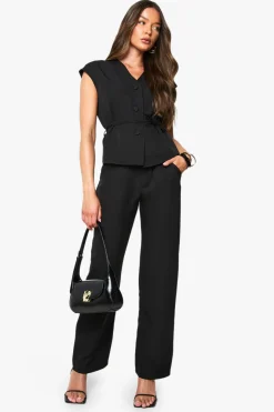 Gilet ajusté ceinturé à manches cap