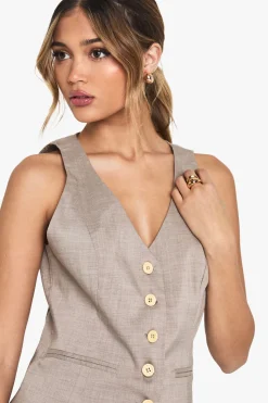 Gilet ajusté sur mesure à boutons en bois