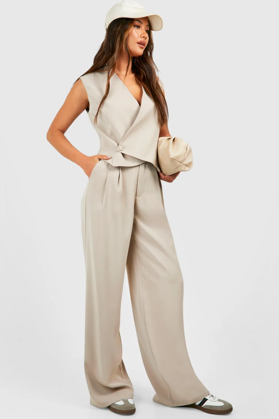 Gilet asymétrique boutonné à l'avant