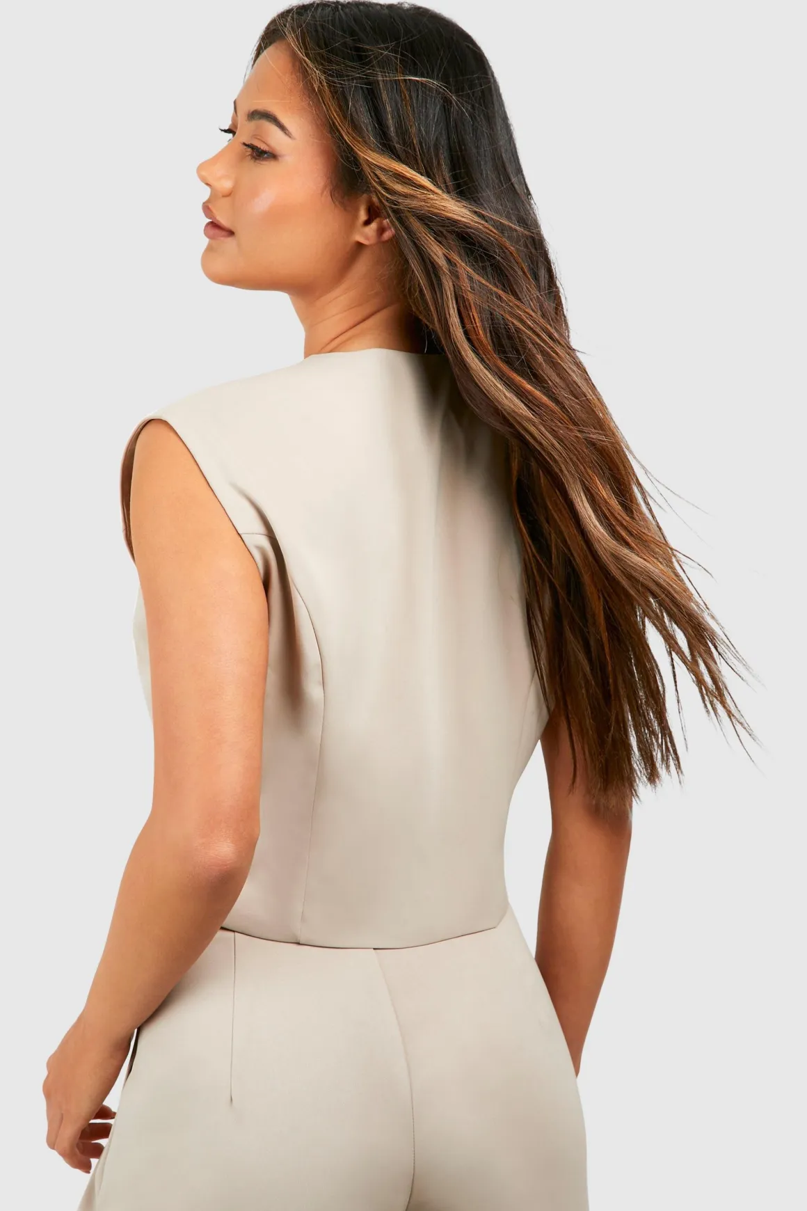 Gilet asymétrique boutonné à l'avant