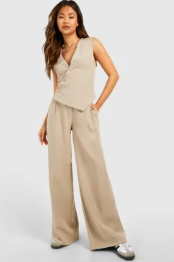 Gilet asymétrique réglable à l'arrière