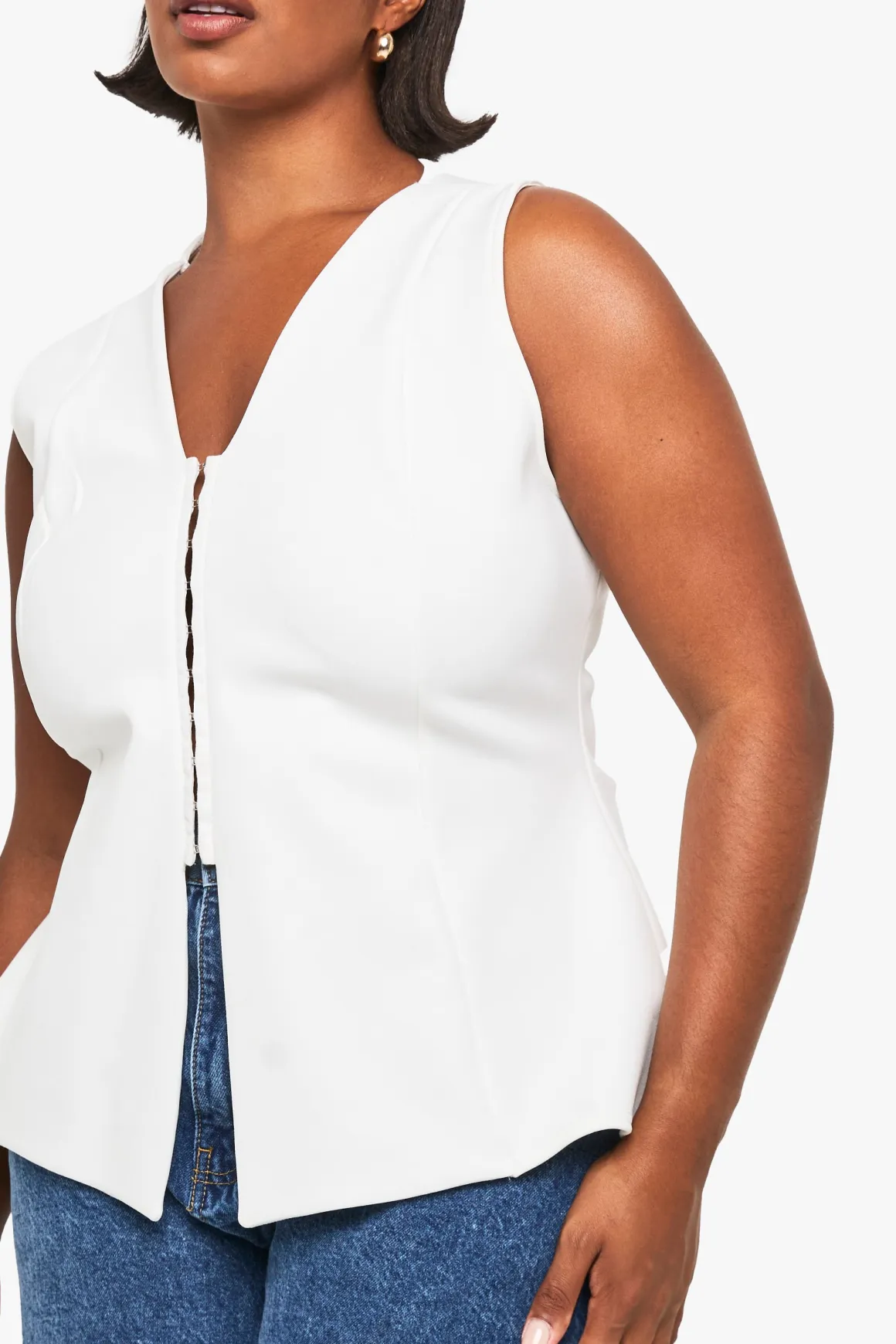 Gilet cintré à crochets et œillets Plus