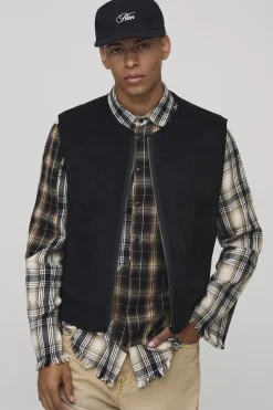 Gilet à coupe boxy réversible en synthétique et suédé