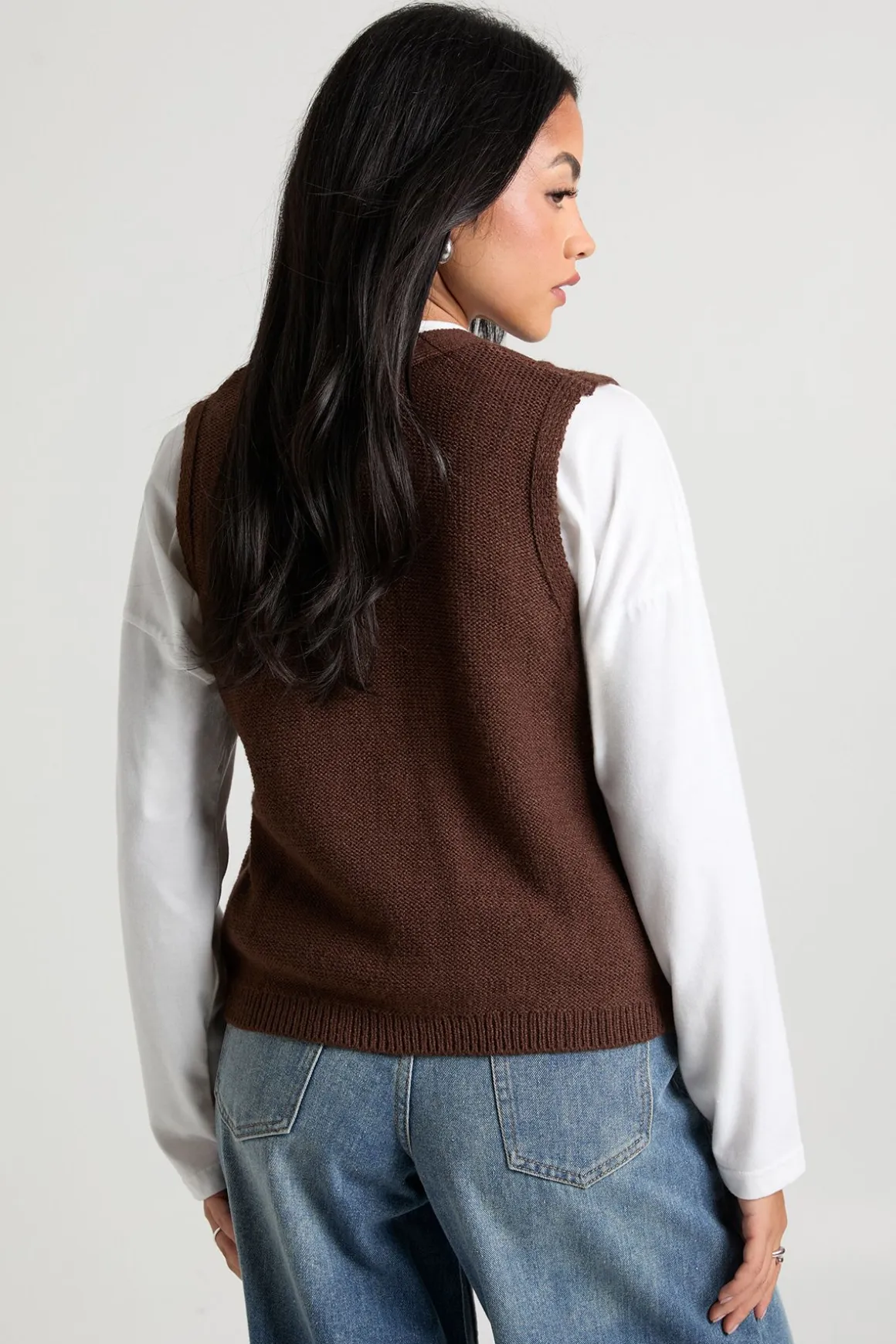 Gilet en maille côtelée à bouton bascule