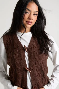Gilet en maille côtelée à bouton bascule