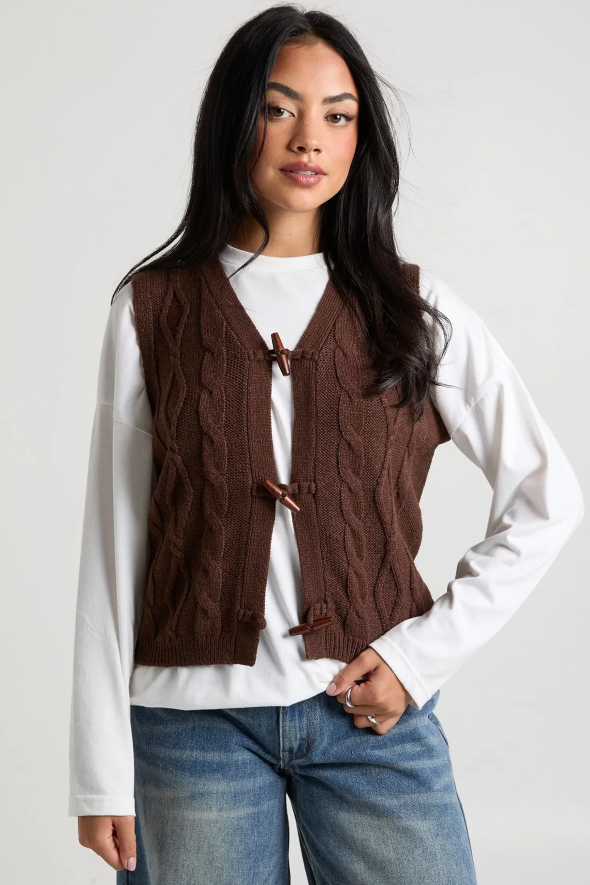Gilet en maille côtelée à bouton bascule