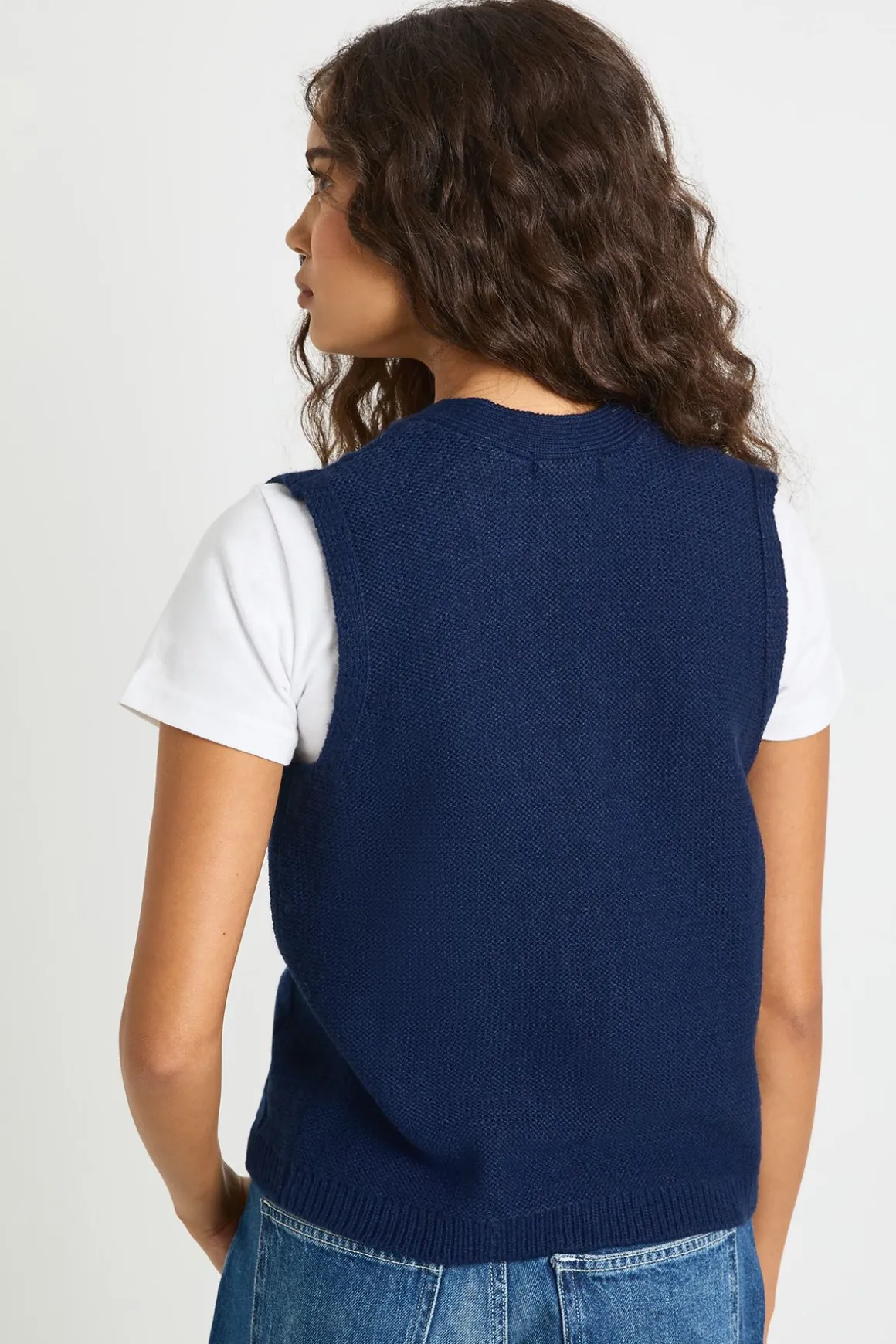 Gilet en maille torsadée à boutons à bascule