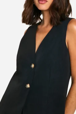 Gilet longline à boutons imitation corne