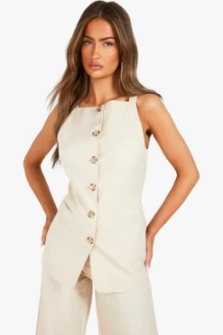 Gilet long texturé à l'aspect de corne imité et boutonné sur le devant