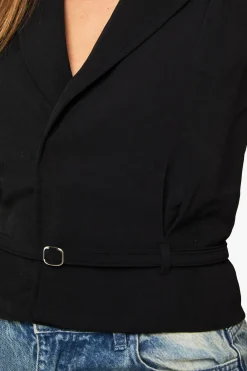 Gilet à épaulettes ceinturé