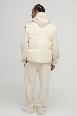 Gilet puffer tricoté à col entonnoir, coupe boxy